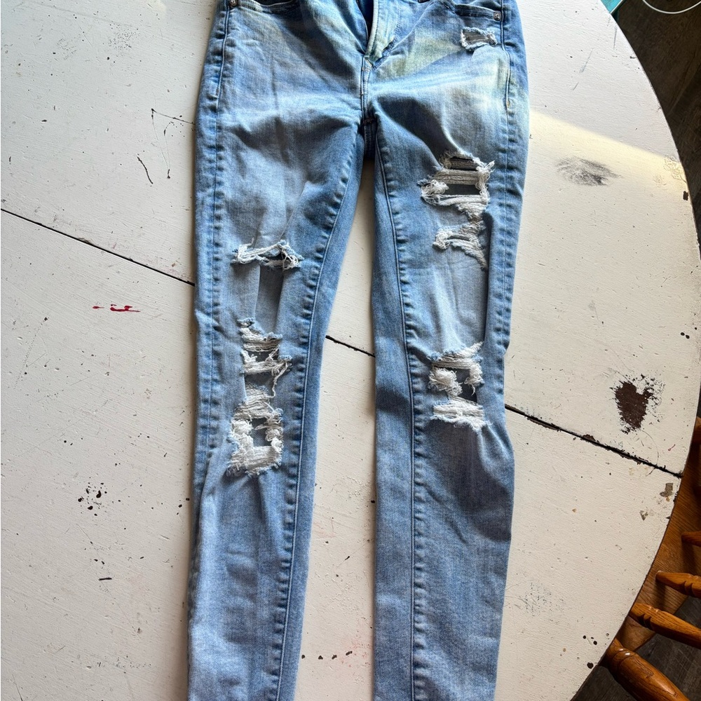 Women's Distressed Blue Jeans